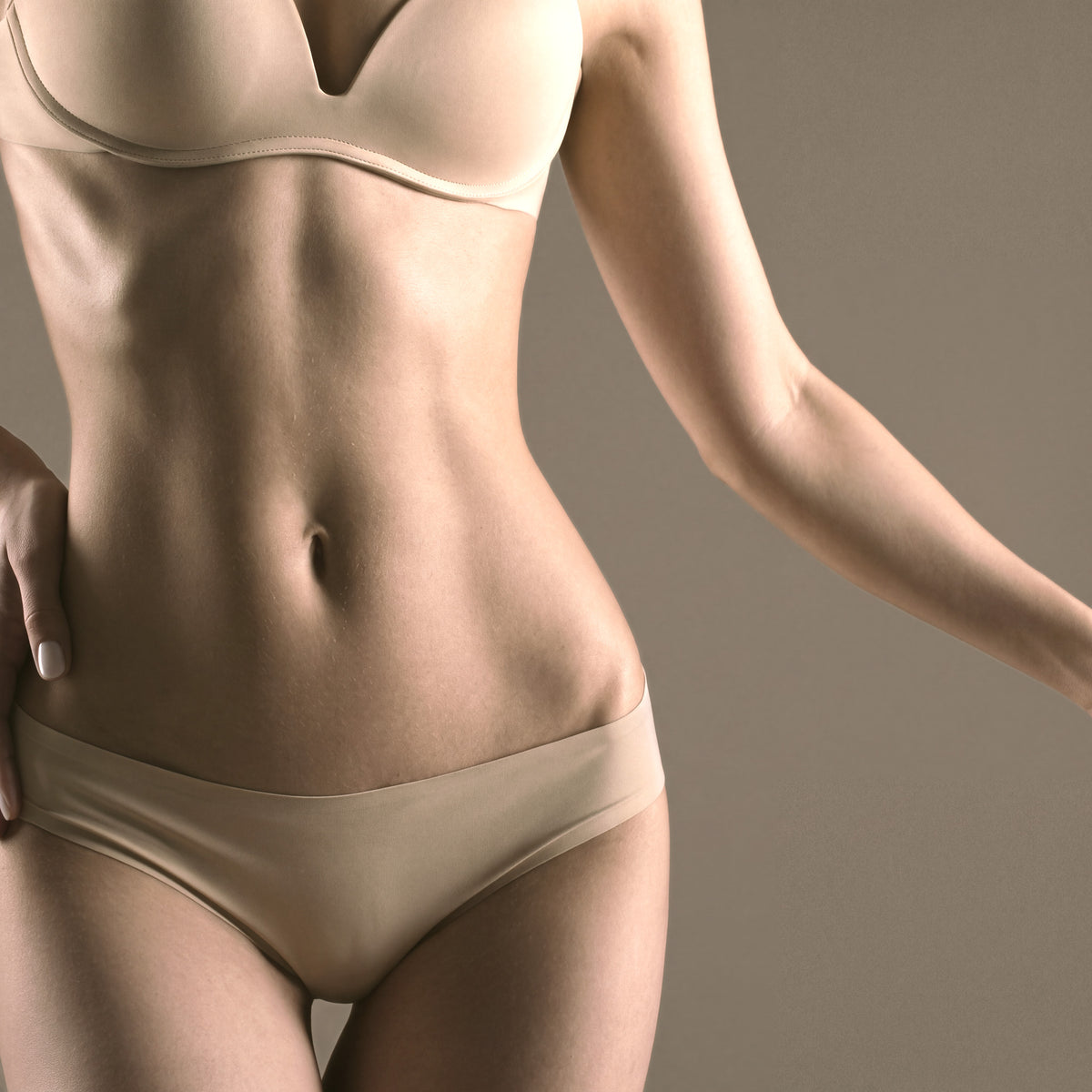 Abdomen treatment area highlighted for laser hair removal at Bare Beauty Collective in Suffern, NY