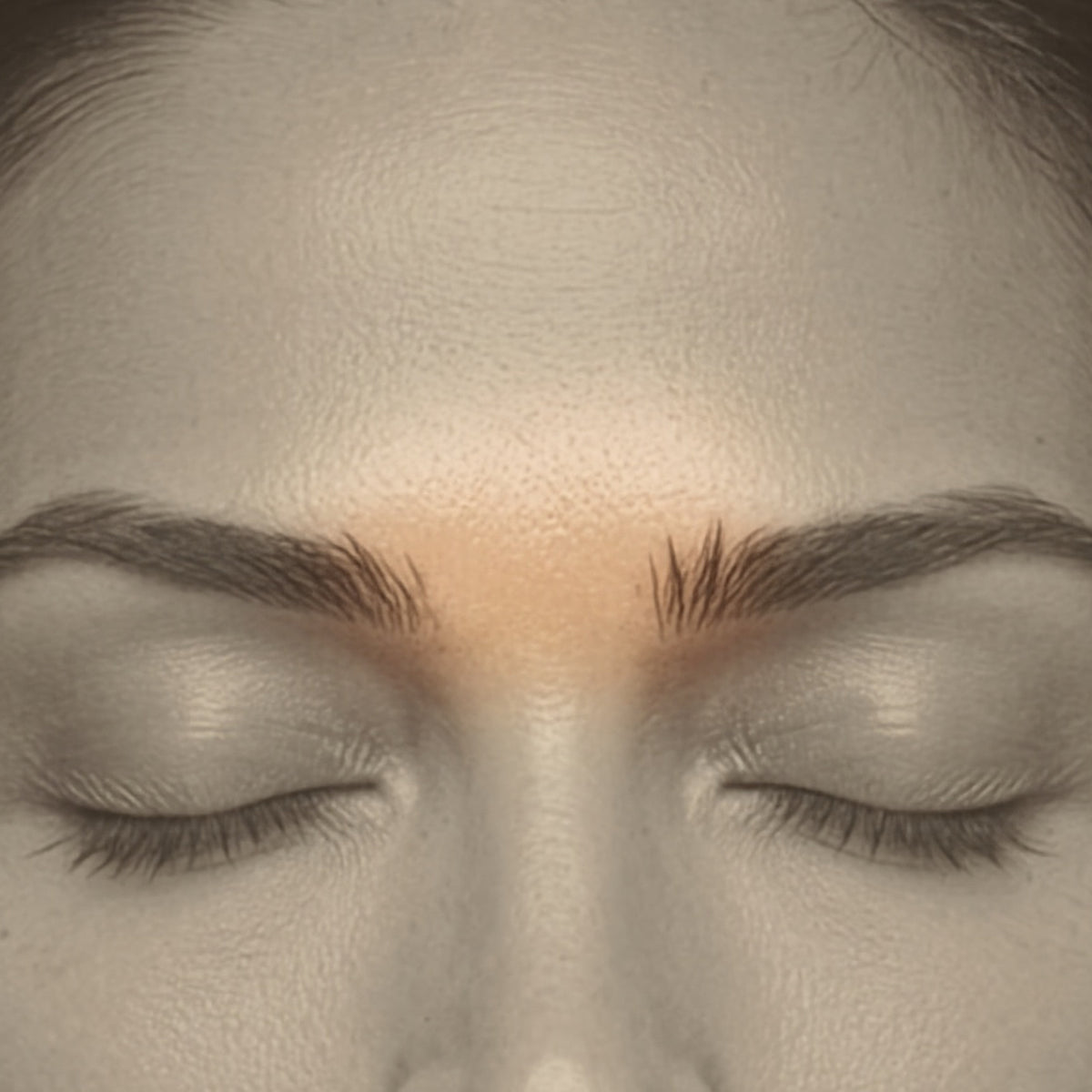 Close-up of the eyebrow center treatment area for laser hair removal at Bare Beauty Collective in Suffern, NY
