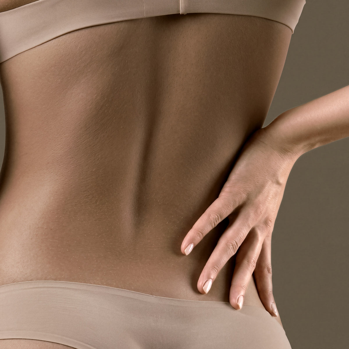 Half back treatment area highlighted for laser hair removal at Bare Beauty Collective in Suffern, NY
