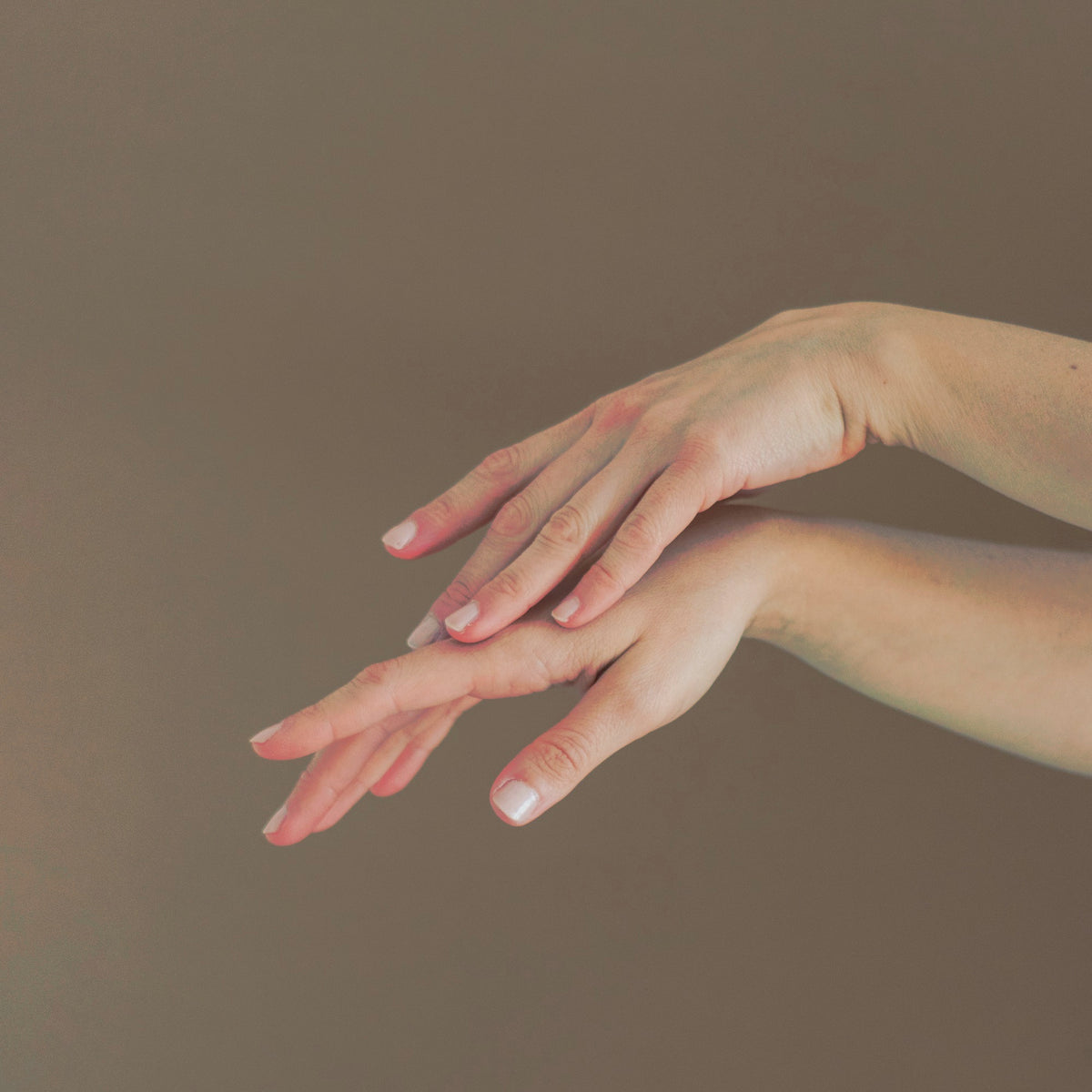 Hands and fingers treatment area highlighted for laser hair removal at Bare Beauty Collective in Suffern, NY